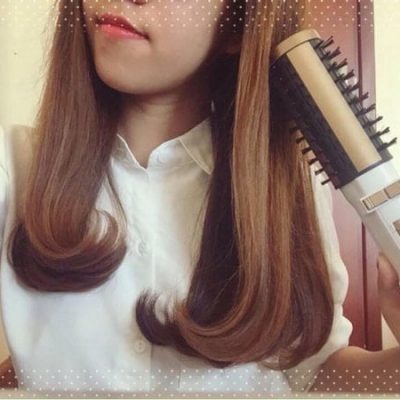 Lược điện xoay 360 độ Kemei KM-817 tiện ích